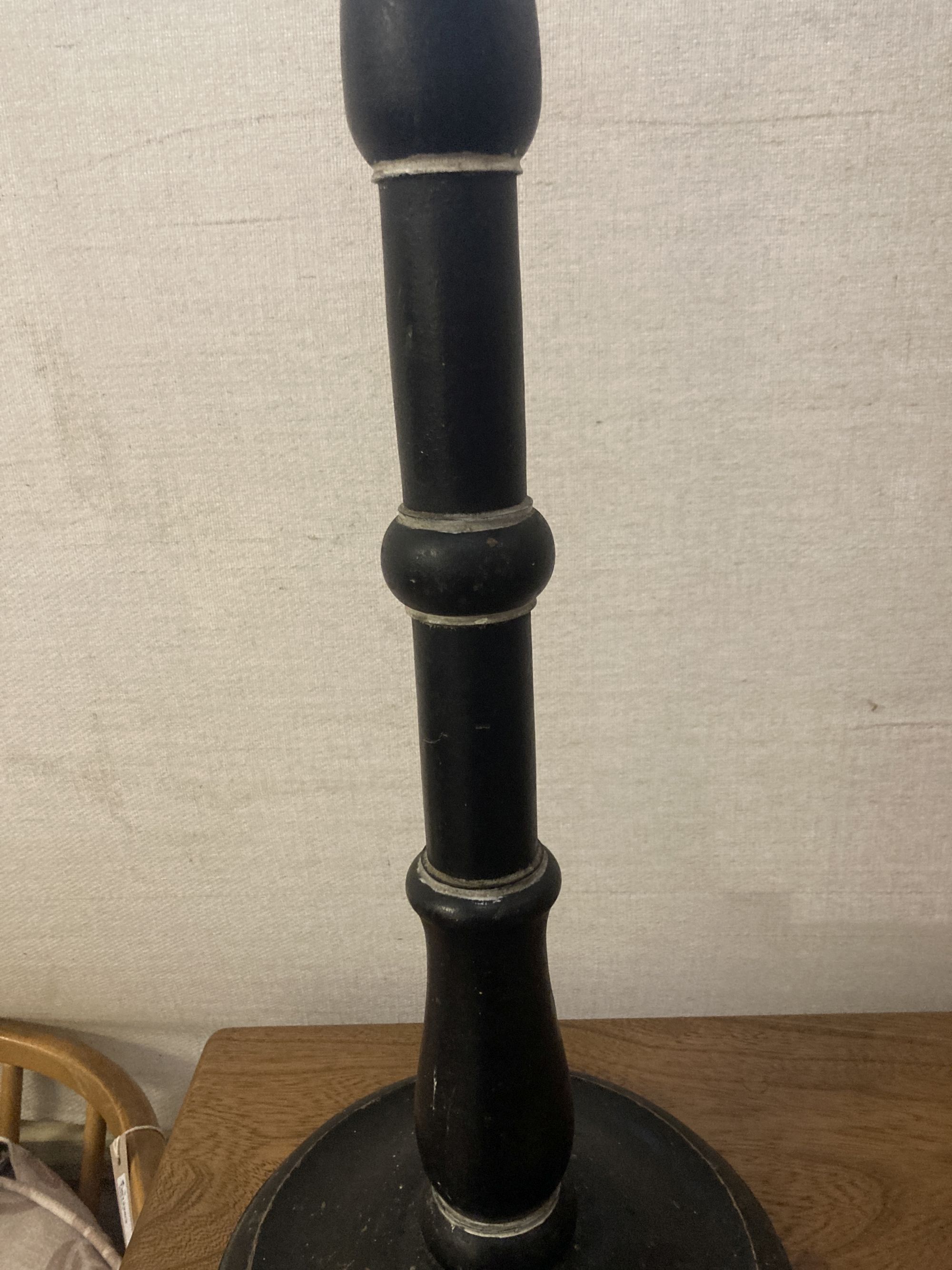 A painted turned wood pricket candlestick, height 75cm